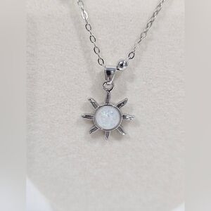 Silver Sunburst Pendant Necklace